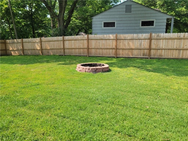 8218 W 87th St, Overland Park, KS 66212 - view of yard featuring a fire pit