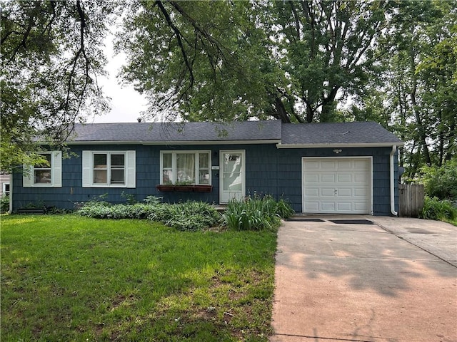 3801 N Osage St, Independence, MO 64050 - single story home with an attached garage and concrete driveway