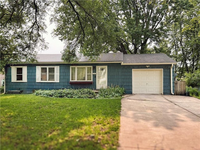 3801 N Osage St, Independence, MO 64050 - ranch-style home with driveway and an attached garage