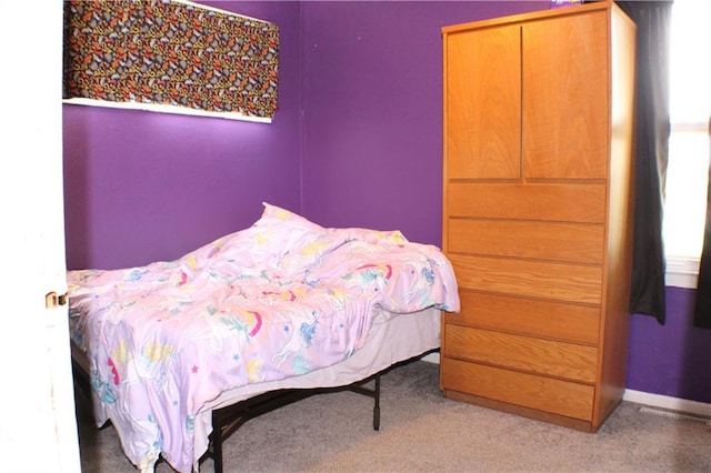 3801 N Osage St, Independence, MO 64050 - carpeted bedroom featuring baseboards