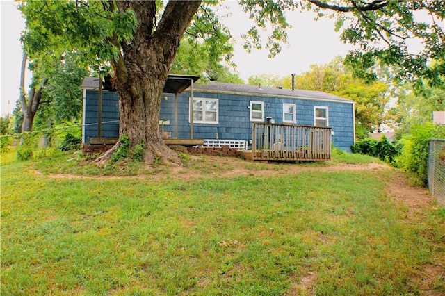 3801 N Osage St, Independence, MO 64050 - back of house with a wooden deck and a fenced backyard