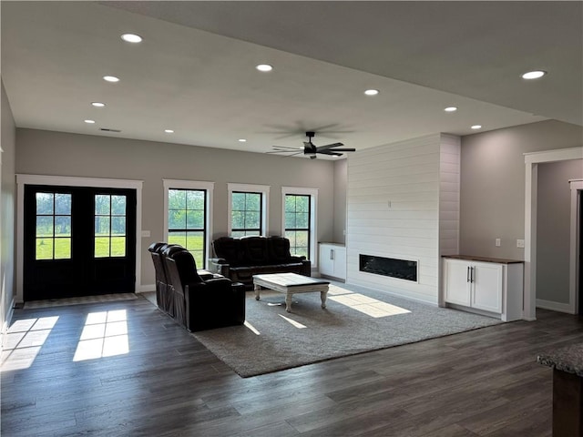 25908 E 317th Ter, Harrisonville, MO 64701 - living room featuring recessed lighting, a large fireplace, dark wood finished floors, and a ceiling fan