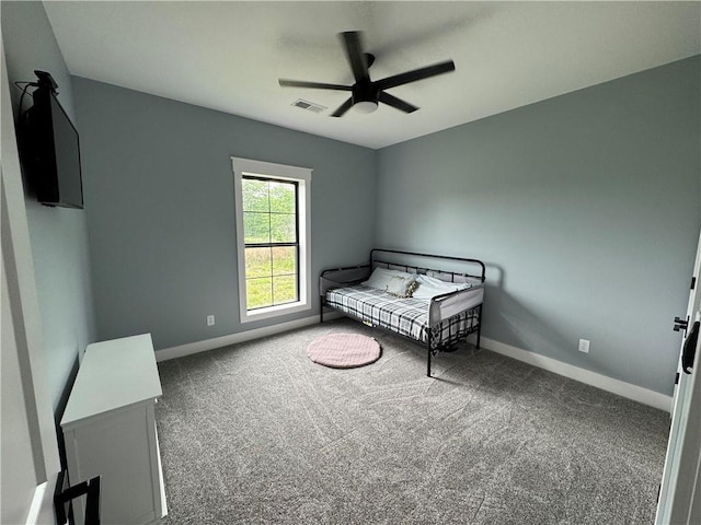 25908 E 317th Ter, Harrisonville, MO 64701 - bedroom with carpet flooring, baseboards, and a ceiling fan