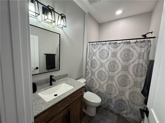 25908 E 317th Ter, Harrisonville, MO 64701 - full bath featuring toilet, vanity, and a shower with curtain