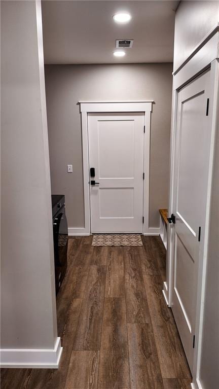 25908 E 317th Ter, Harrisonville, MO 64701 - doorway to outside with dark wood-style flooring, baseboards, and recessed lighting