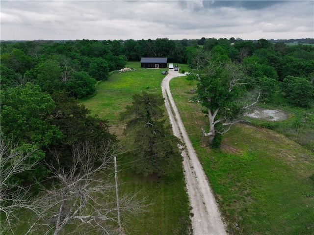 25908 E 317th Ter, Harrisonville, MO 64701 - view of subject property featuring a heavily wooded area