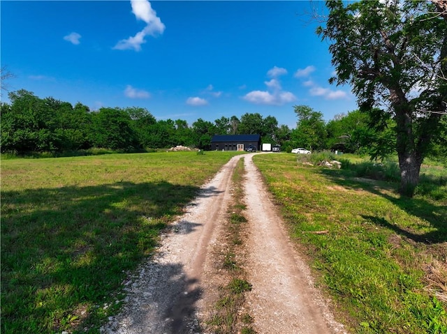 25908 E 317th Ter, Harrisonville, MO 64701 - view of dirt / gravel driveway