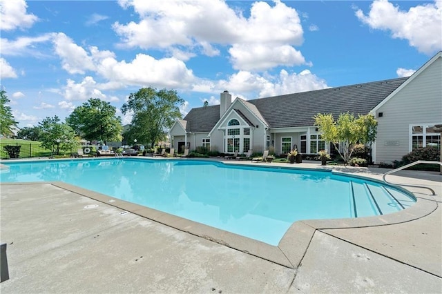 11619 Tomahawk Creek Pkwy Unit B, Leawood, KS 66211 - swimming pool with a patio