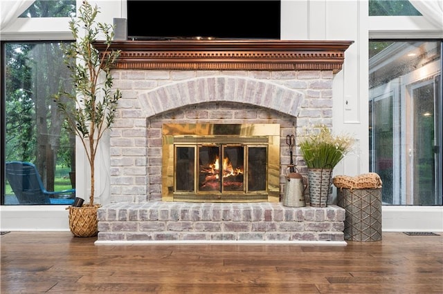 26725 S Bennett Rd, Freeman, MO 64746 - detailed view of a fireplace and wood finished floors