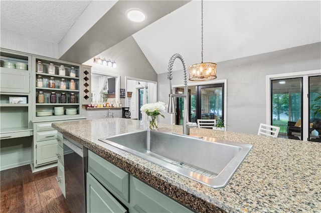 26725 S Bennett Rd, Freeman, MO 64746 - kitchen featuring a sink, green cabinets, stainless steel dishwasher, dark wood finished floors, and a chandelier