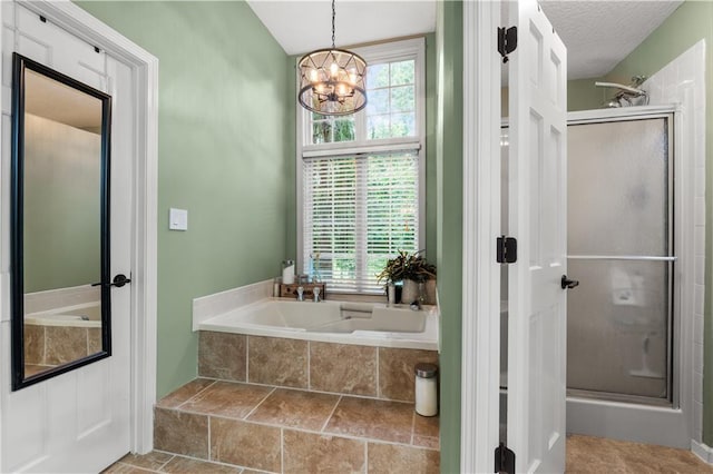 26725 S Bennett Rd, Freeman, MO 64746 - full bathroom featuring a bath, a shower stall, and a chandelier