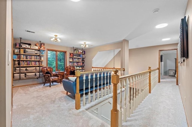 26725 S Bennett Rd, Freeman, MO 64746 - sitting room with carpet flooring and an upstairs landing