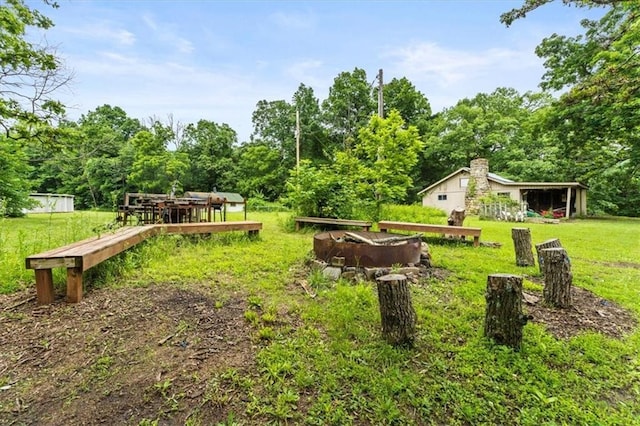 26725 S Bennett Rd, Freeman, MO 64746 - view of green lawn with an outdoor structure