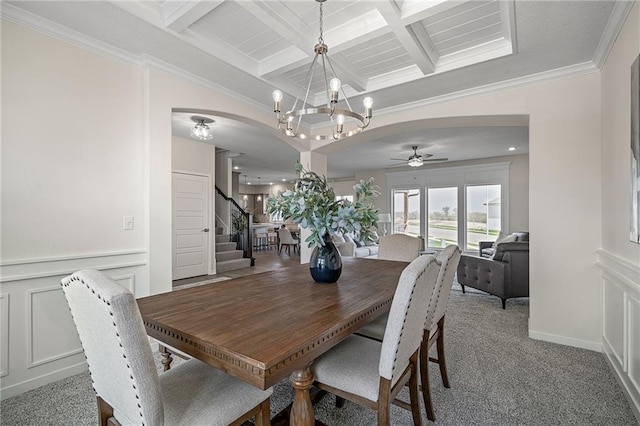 11487 S Cornice St, Olathe, KS 66061 - dining area featuring a chandelier, coffered ceiling, stairway, beam ceiling, and a decorative wall
