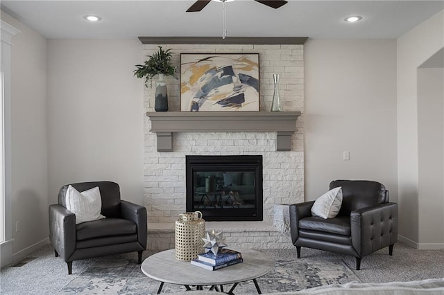 11487 S Cornice St, Olathe, KS 66061 - carpeted living room featuring ceiling fan, baseboards, a fireplace, and recessed lighting