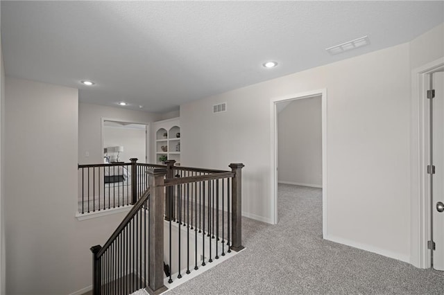 11487 S Cornice St, Olathe, KS 66061 - hall with an upstairs landing, carpet, baseboards, and recessed lighting
