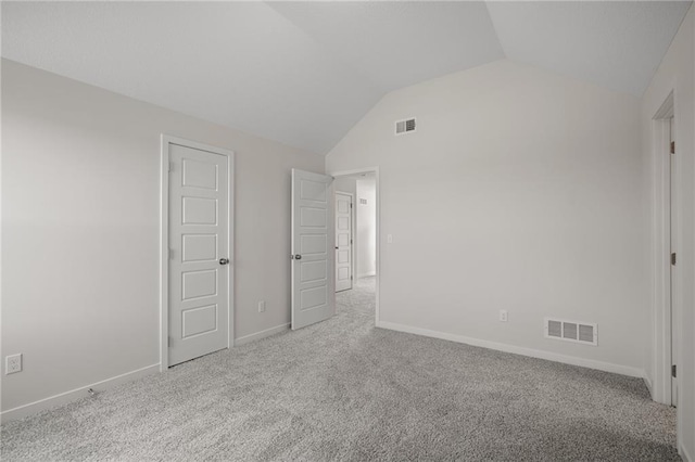 11487 S Cornice St, Olathe, KS 66061 - unfurnished bedroom with vaulted ceiling, carpet, and baseboards