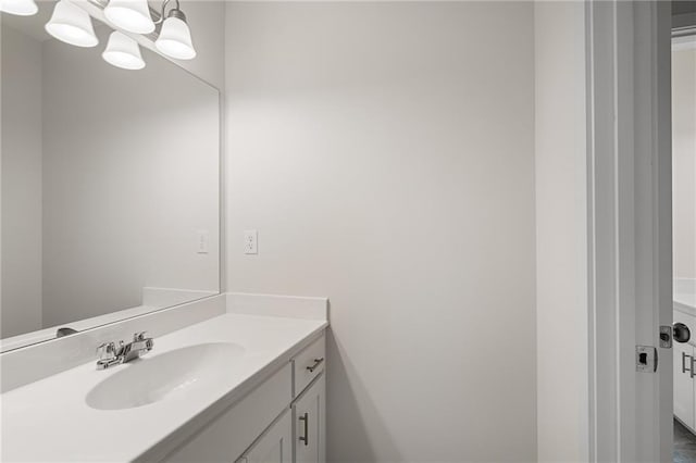 11487 S Cornice St, Olathe, KS 66061 - bathroom with vanity and a chandelier