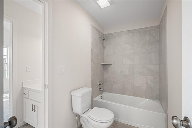 11487 S Cornice St, Olathe, KS 66061 - bathroom featuring toilet, vanity, and shower / bathtub combination