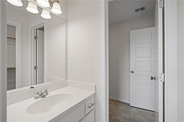 11487 S Cornice St, Olathe, KS 66061 - bathroom featuring vanity and baseboards