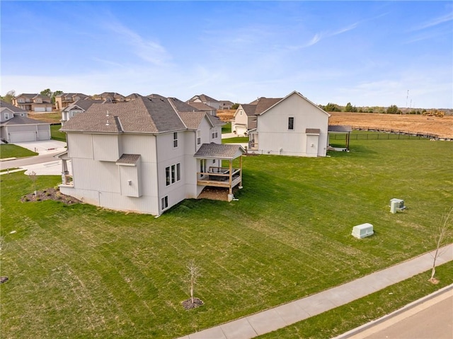 11487 S Cornice St, Olathe, KS 66061 - view of home's exterior with a residential view, a shingled roof, and a deck