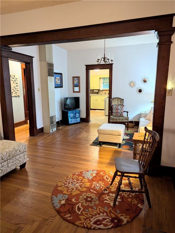 429 N 12th St, Fredonia, KS 66736 - living area featuring baseboards and light wood-style floors
