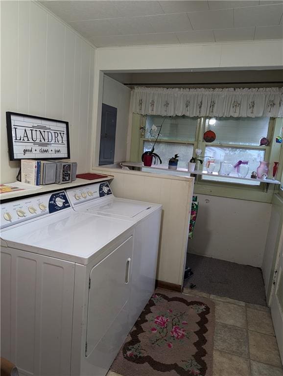 429 N 12th St, Fredonia, KS 66736 - laundry area with washer and clothes dryer and electric panel