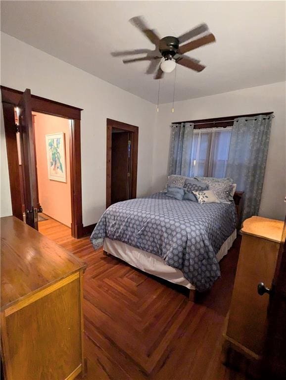 429 N 12th St, Fredonia, KS 66736 - bedroom with a ceiling fan and parquet flooring