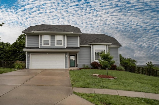 7132 Woodstock St, Shawnee, KS 66218 - traditional home featuring an attached garage and concrete driveway
