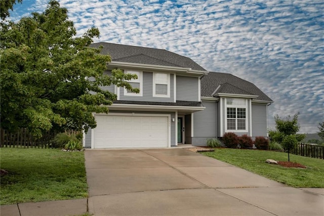 7132 Woodstock St, Shawnee, KS 66218 - view of front of property featuring concrete driveway and a garage