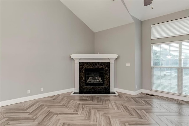 7132 Woodstock St, Shawnee, KS 66218 - detailed view of ceiling fan, baseboards, and a fireplace