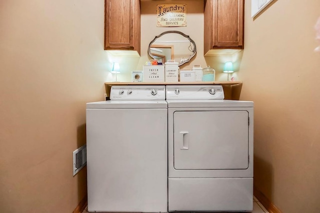 600 N Oak St, Gardner, KS 66030 - washroom featuring cabinet space and independent washer and dryer