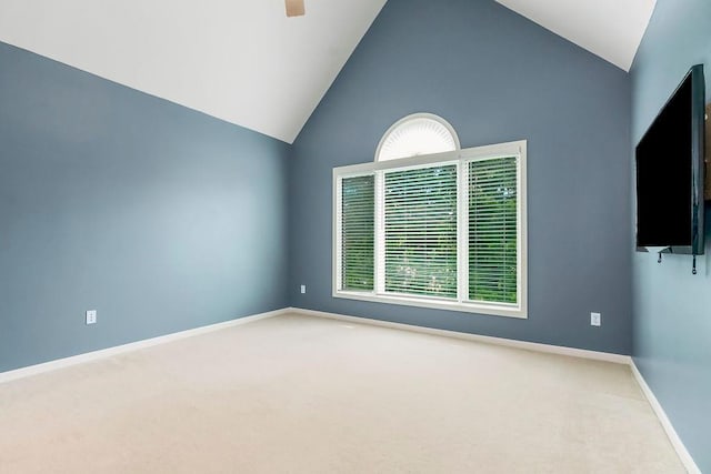 600 N Oak St, Gardner, KS 66030 - carpeted empty room with vaulted ceiling and a ceiling fan