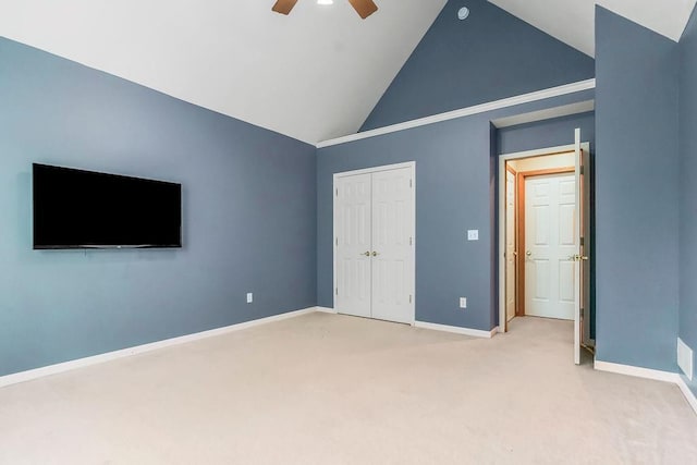 600 N Oak St, Gardner, KS 66030 - unfurnished bedroom featuring light carpet, a closet, a ceiling fan, and high vaulted ceiling