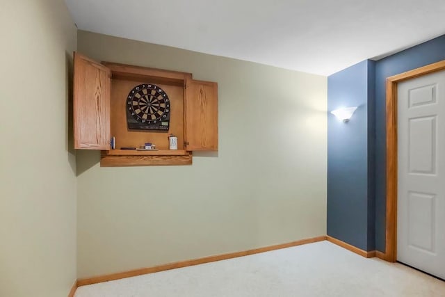 600 N Oak St, Gardner, KS 66030 - empty room with baseboards and light carpet