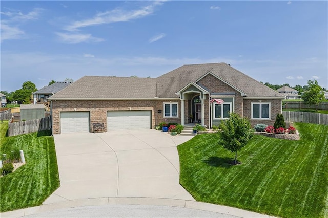 14165 Ashbury Ct, Basehor, KS 66007 - ranch-style home featuring driveway, a garage, brick siding, and roof with shingles