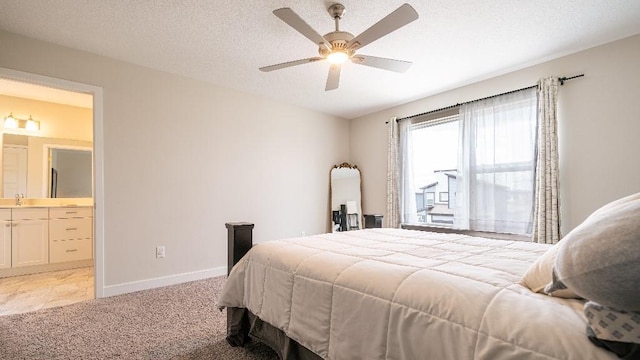13333 W 180th St, Overland Park, KS 66013 - bedroom featuring light colored carpet, ensuite bathroom, baseboards, a sink, and ceiling fan