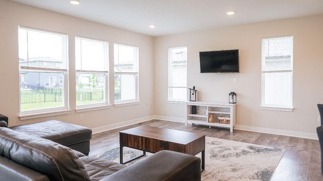 13333 W 180th St, Overland Park, KS 66013 - living room with wood finished floors, baseboards, and recessed lighting