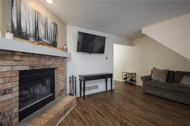 706 Cedar Dr Unit C, Warrensburg, MO 64093 - living room with wood finished floors, a fireplace, and recessed lighting