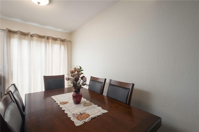706 Cedar Dr Unit C, Warrensburg, MO 64093 - dining space with lofted ceiling