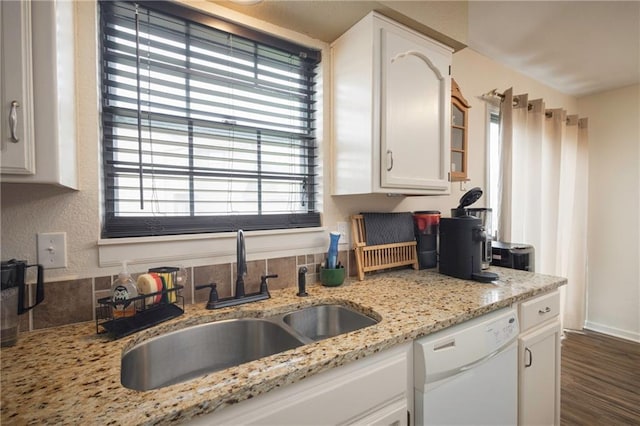 706 Cedar Dr Unit C, Warrensburg, MO 64093 - kitchen featuring dishwasher, white cabinets, plenty of natural light, and light stone countertops