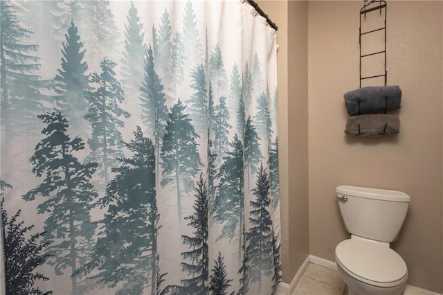 706 Cedar Dr Unit C, Warrensburg, MO 64093 - bathroom with tile patterned flooring and a shower with curtain