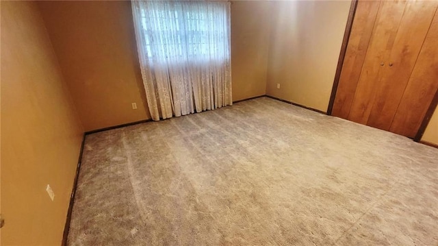 1045 Yale Rd, Mapleton, KS 66754 - carpeted empty room with baseboards