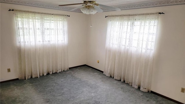 1045 Yale Rd, Mapleton, KS 66754 - unfurnished room featuring ceiling fan, light carpet, and baseboards