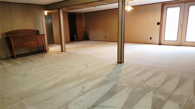 1045 Yale Rd, Mapleton, KS 66754 - below grade area featuring light colored carpet and french doors