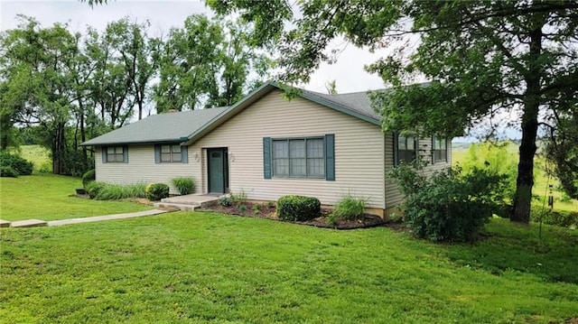 1045 Yale Rd, Mapleton, KS 66754 - ranch-style home featuring a front lawn
