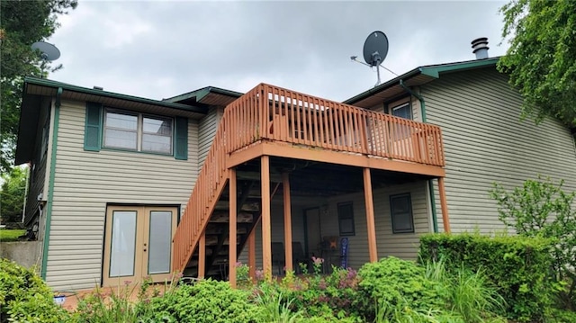 1045 Yale Rd, Mapleton, KS 66754 - rear view of house featuring a deck and stairway