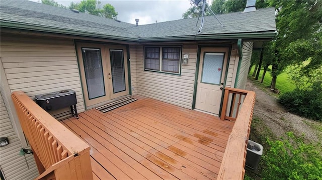 1045 Yale Rd, Mapleton, KS 66754 - deck with french doors and central air condition unit