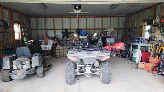 1045 Yale Rd, Mapleton, KS 66754 - garage featuring a garage door opener