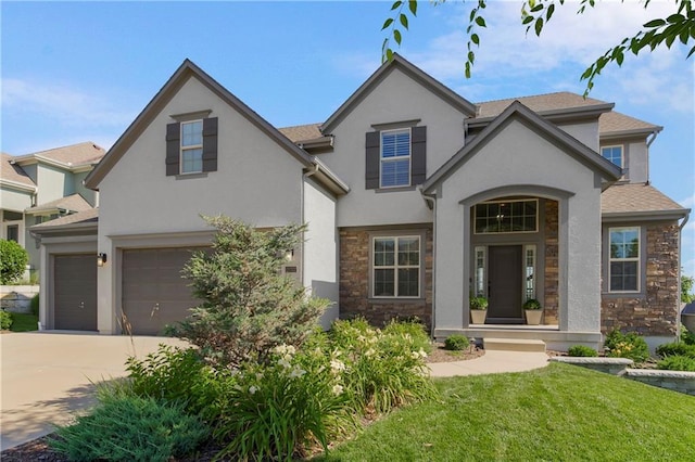 21222 W 46th Ter, Shawnee, KS 66218 - view of front of property with stone siding, stucco siding, concrete driveway, and a front yard